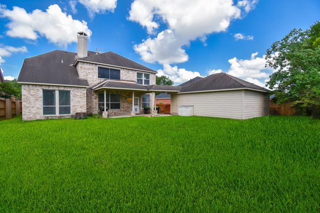 Bask in the outdoors with your beautiful backyard! Plenty of space for a pool, trampoline and swingset. | Image 31