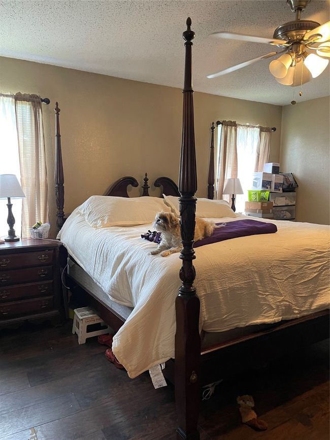 Bedroom with a ceiling fan | Image 9