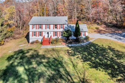 Colonial-style house with a front yard | Image 3