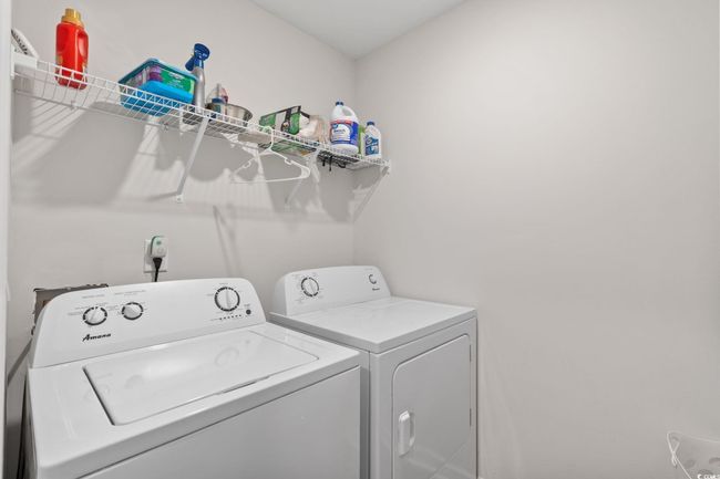 Washroom featuring washing machine and dryer | Image 27