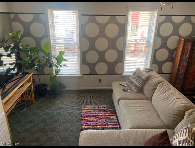 View of carpeted living room | Image 12