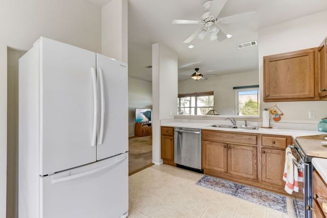 Kitchen: "A kitchen designed for both daily living and entertaining—featuring stainless steel appliances and a convenient breakfast nook. ???? #ChefApproved #ModernLiving" | Image 11