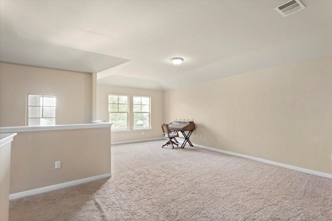Open concept, spacious upstairs loft. | Image 19