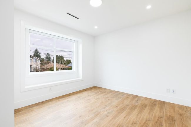 Unfurnished room with light wood-type flooring and recessed lighting | Image 19