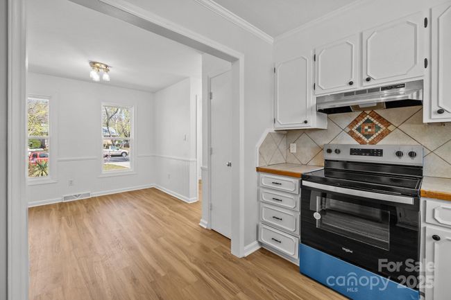 Kitchen into dining | Image 15