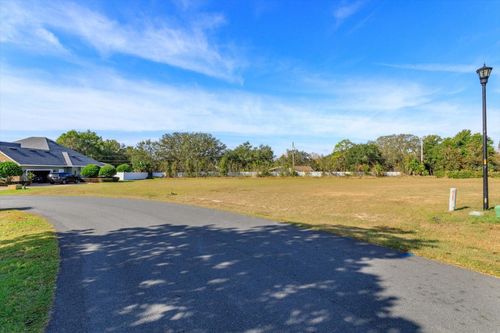 1002 Myrtle Breezes Ct, Fruitland Park, FL, 34731-6547 | Card Image