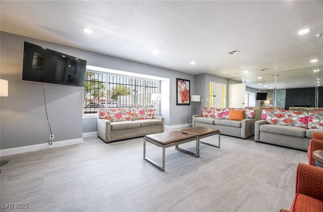 Living area with baseboards and recessed lighting | Image 8
