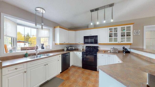 55 Poplar Crescent, House other with 6 bedrooms, 3 bathrooms and 10 parking in Gregoire Lake Estates AB | Image 8