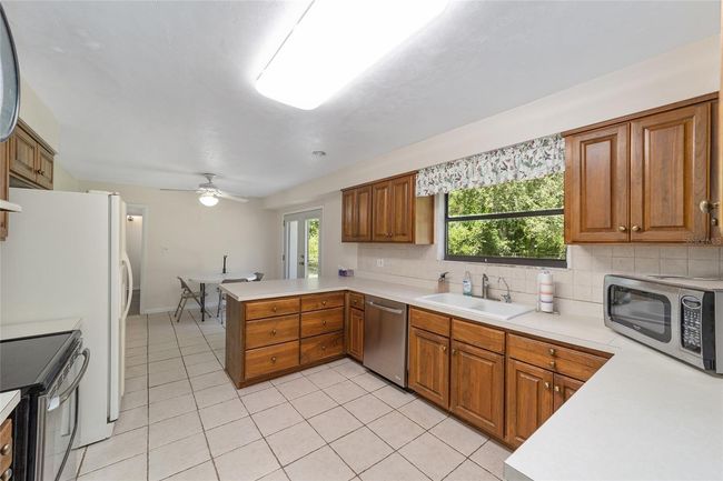 13207 Sw Williston Rd, House other with 3 bedrooms, 2 bathrooms and null parking in MICANOPY FL | Image 6