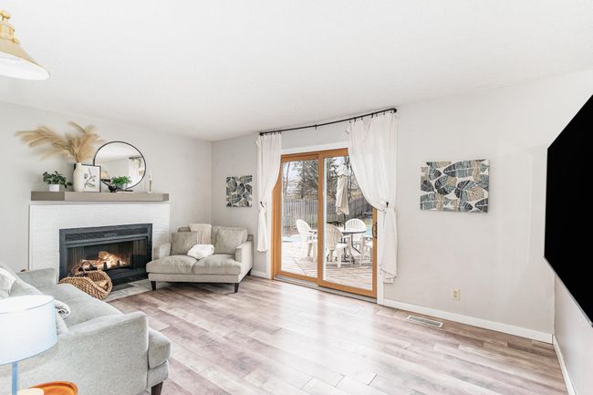 Family room leading out to in-ground pool | Image 9