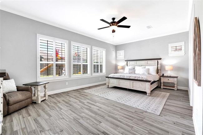 Plantation shutters adds luxury to extended primary suite | Image 25