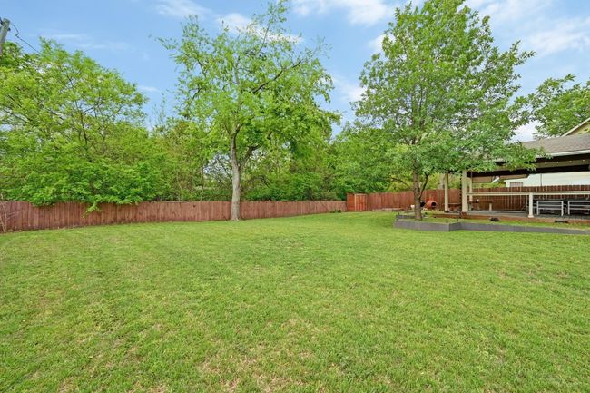 excellent privacy with no direct back neighbors and a swath of woods running behind your fence line. | Image 39