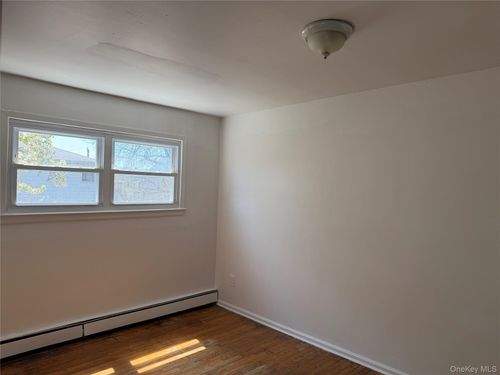 6935 De Costa Ave, Arverne, NY, 11692-1115 | Card Image