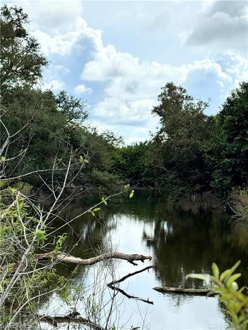7253 Kreamers Dr, BOKEELIA, FL, 33922 | Card Image