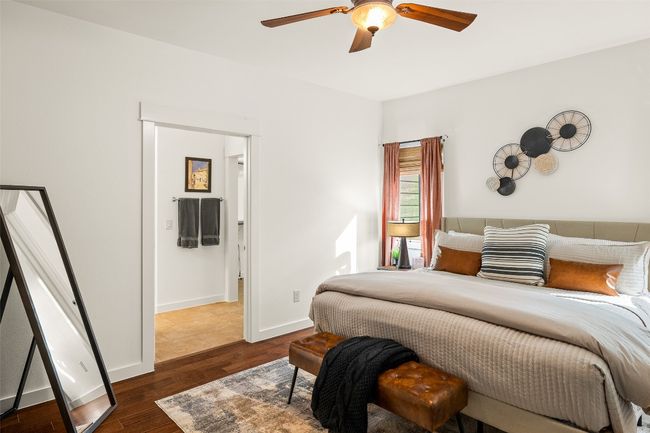 Bedroom featuring dark wood-style floors and ceiling fan | Image 16