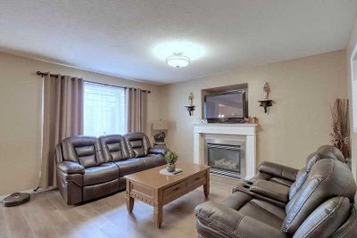 125 Cougar Plateau Mews Sw, House detached with 4 bedrooms, 2 bathrooms and 5 parking in Calgary AB | Image 3