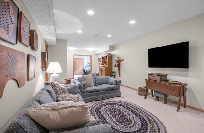 Basement family room with mounted tv. Mount will stay-tv will not. **This is for all tvs and tv mounts** | Image 22