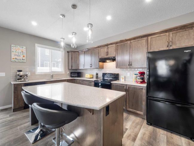 12 Yorkstone Heath Sw, Home with 4 bedrooms, 2 bathrooms and 4 parking in Calgary AB | Image 10