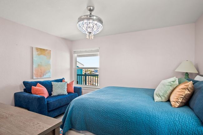 Guest bedroom with additional seating and lots of natural light | Image 24