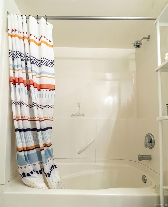 Bathroom featuring shower / bath combo | Image 11