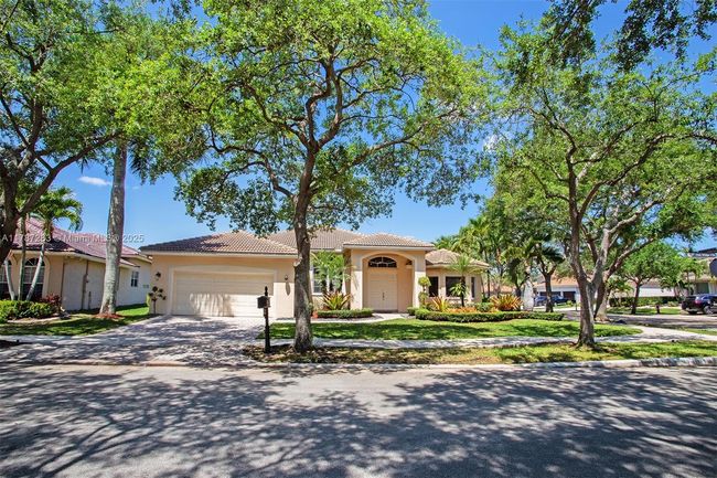 3848 Oak Ridge Cir, House other with 4 bedrooms, 3 bathrooms and null parking in Weston FL | Image 67