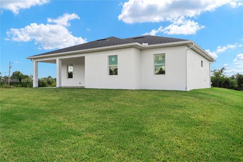 1027 Kirkwood St, Lehigh Acres, FL, 33974-2671 | Card Image