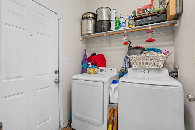 Laundry area inside the home. | Image 25