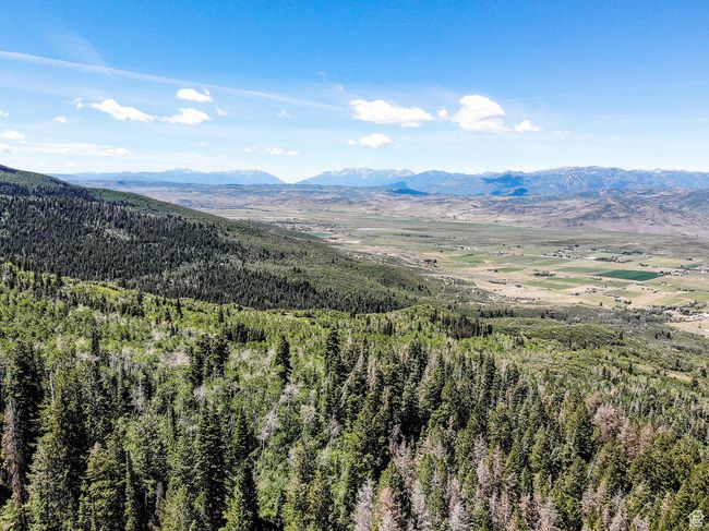 View of mountain feature featuring a view of trees | Image 27