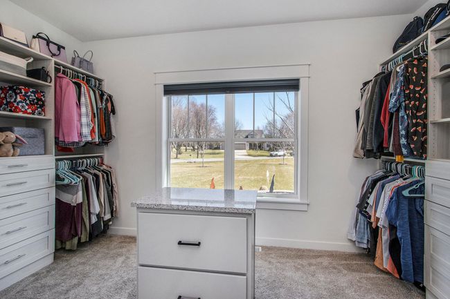 Primary walk-in closet with custom built-ins | Image 22