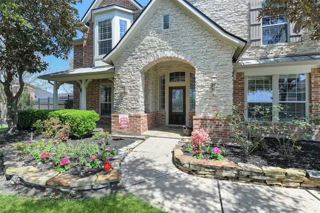 This is beautifully updated Trendmaker home with Brick and Stone front elevation. | Image 6