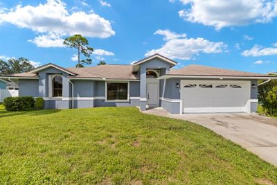 517 Nw Placid Avenue, House other with 3 bedrooms, 2 bathrooms and null parking in Port St. Lucie FL | Image 1