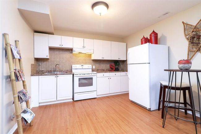 1350 Sutherland Ave, House other with 5 bedrooms, 3 bathrooms and 4 parking in Port Coquitlam BC | Image 27