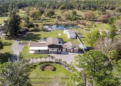 Aerial view featuring a water view | Image 1