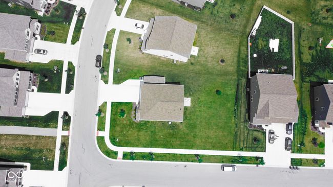 aerial overview of property's location with nearby suburban area | Image 7