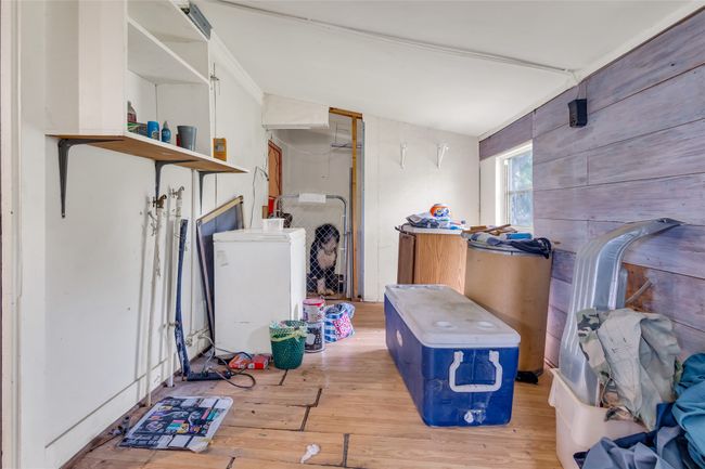 Below grade area with hardwood / wood-style floors and washer / clothes dryer | Image 10