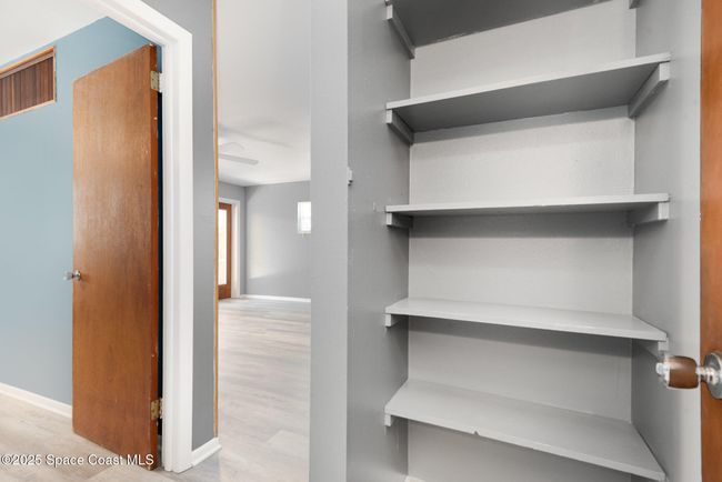 Additional storage area outside of bathroom | Image 8