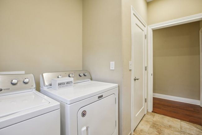 Laundry area featuring separate washer and dryer | Image 18
