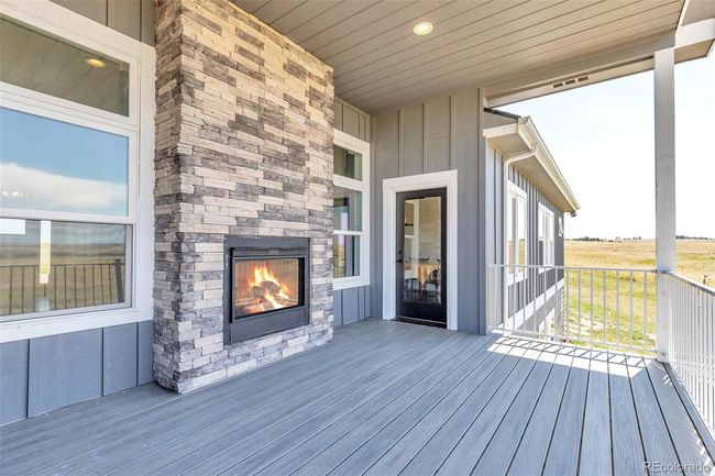 Main Level Deck w/double sided fireplace | Image 31