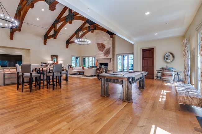 Great Room has plenty of space for a pool table, game table, and even Cornhole boards! | Image 13