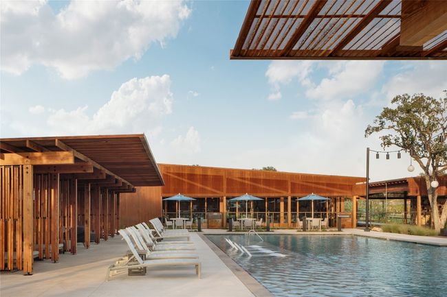Community pool with a patio area | Image 39