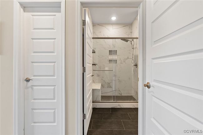 Bathroom with tile patterned flooring and walk in shower | Image 37