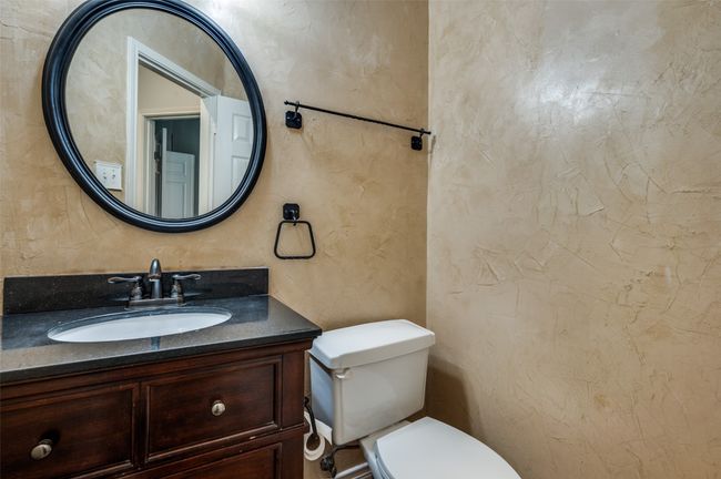 Bathroom with toilet and vanity | Image 15