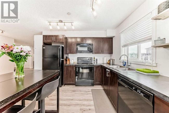 279 Copperpond Common Se, Condo with 2 bedrooms, 2 bathrooms and 1 parking in Calgary AB | Image 4
