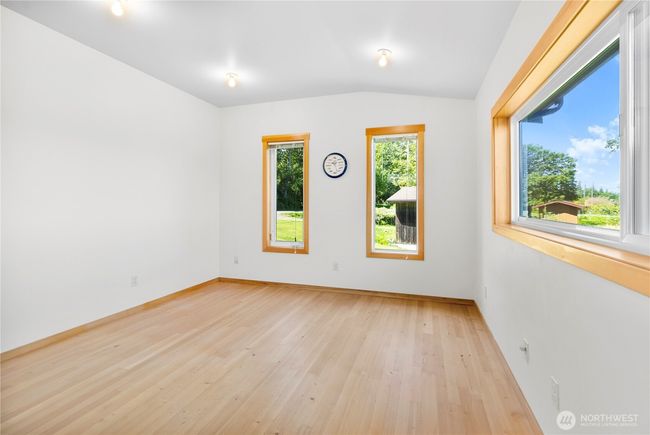 Versatile studio/office space above detached shop. Virtually staged | Image 31