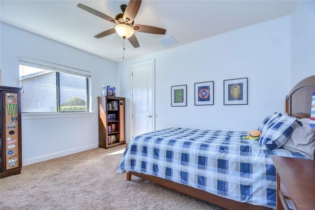 Step into a cozy bedroom where character meets comfort. | Image 23