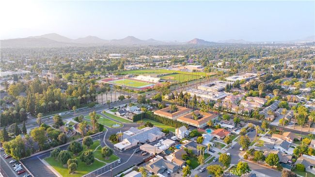 Bird’s-eye views show lot depth, neighborhood proximity, and scale of both main and guest structures. | Image 56
