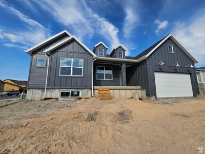 View of front of home featuring a garage | Image 3