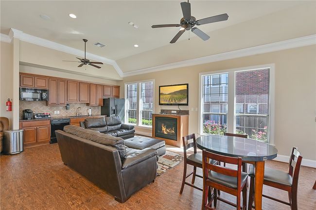Clubhouse lounge area includes a fully stocked coffee bar. | Image 22