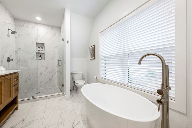 Shower and large soaking tub. | Image 24