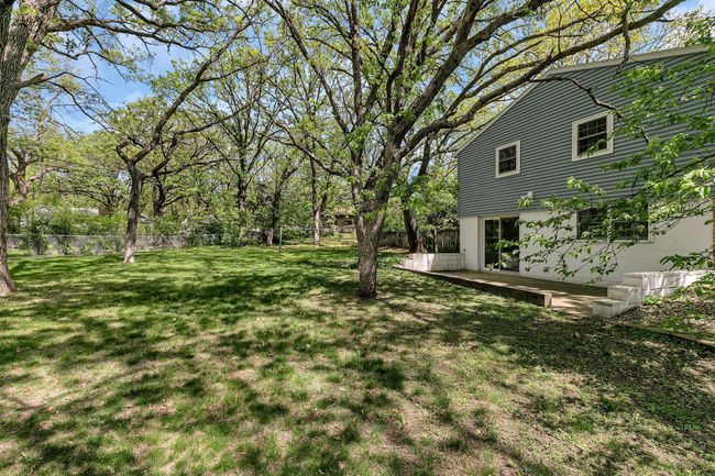 Walkout lower level patio and large side yard! | Image 24